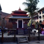 Ganesh Temple surrounded by traditional buildings in Bandipur Bazaar.