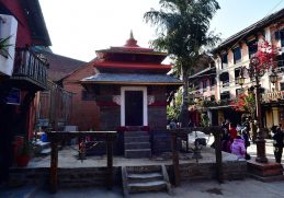 Ganesh Temple surrounded by traditional buildings in Bandipur Bazaar.