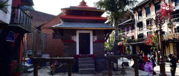 Ganesh Temple surrounded by traditional buildings in Bandipur Bazaar.