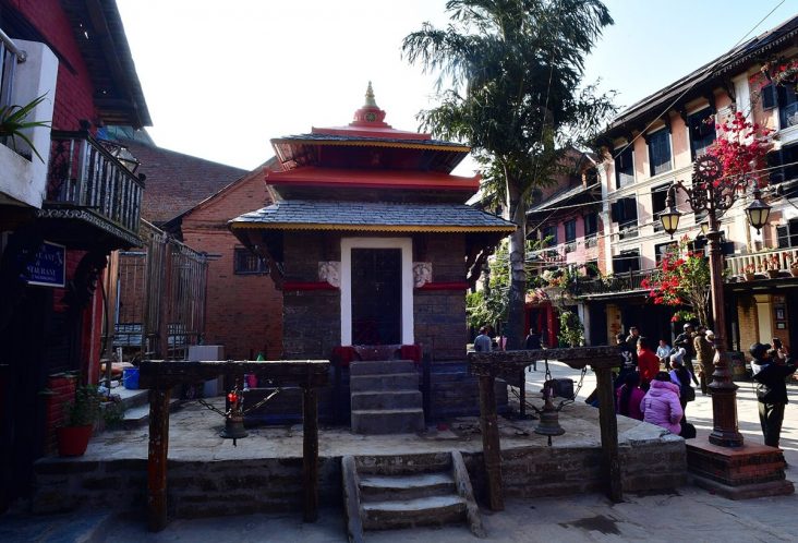 Ganesh Temple surrounded by traditional buildings in Bandipur Bazaar.