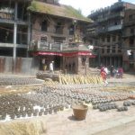 Rows of clay pots drying in Bhaktapur Pottery Square.