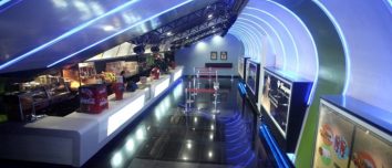 Blue-lit interior of a QFX cinema.