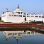 Maya Devi Temple and its reflection in a pool at Lumbini.