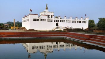 Maya Devi Temple and its reflection in a pool at Lumbini.