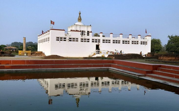 Maya Devi Temple and its reflection in a pool at Lumbini.