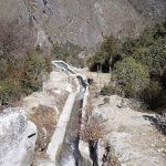 Stone-lined water channel at a Ghunsa micro-hydro installation.