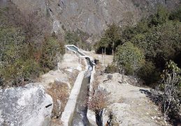 Stone-lined water channel at a Ghunsa micro-hydro installation.