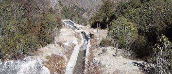 Stone-lined water channel at a Ghunsa micro-hydro installation.