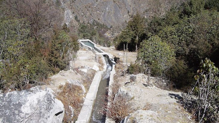 Stone-lined water channel at a Ghunsa micro-hydro installation.