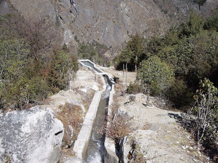 Stone-lined water channel at a Ghunsa micro-hydro installation.