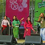 Amrit Gurung singing on stage at the 2006 World Village festival.