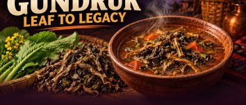 Illustrated bowl of fermented leafy gundruk with fresh mustard greens and dried leaves, under the headline Gundruk: Leaf to Legacy.