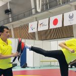 Palesha Goverdhan practising a kick with coach Kabiraj Negi Lama.