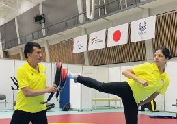 Palesha Goverdhan practising a kick with coach Kabiraj Negi Lama.