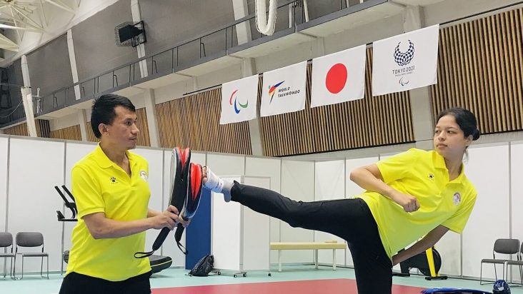 Palesha Goverdhan practising a kick with coach Kabiraj Negi Lama.