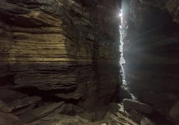 Layered rock surfaces inside Gupteshwor Cave in Pokhara.