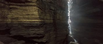 Layered rock surfaces inside Gupteshwor Cave in Pokhara.