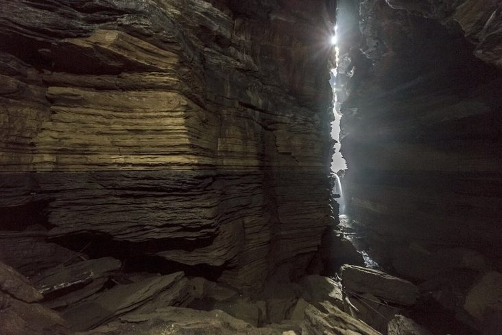 Layered rock surfaces inside Gupteshwor Cave in Pokhara.