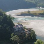 Rani Mahal palace beside a bend in the Kali Gandaki river.