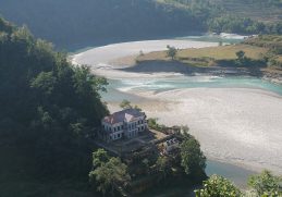 Rani Mahal palace beside a bend in the Kali Gandaki river.