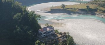 Rani Mahal palace beside a bend in the Kali Gandaki river.
